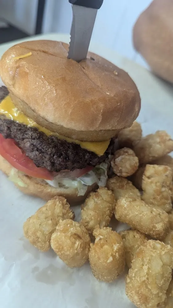 Special of th Day Burger w Jalapeno Popper and Onion Ring Side of Tots
